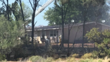 Brush fire threatens homes in St. George area