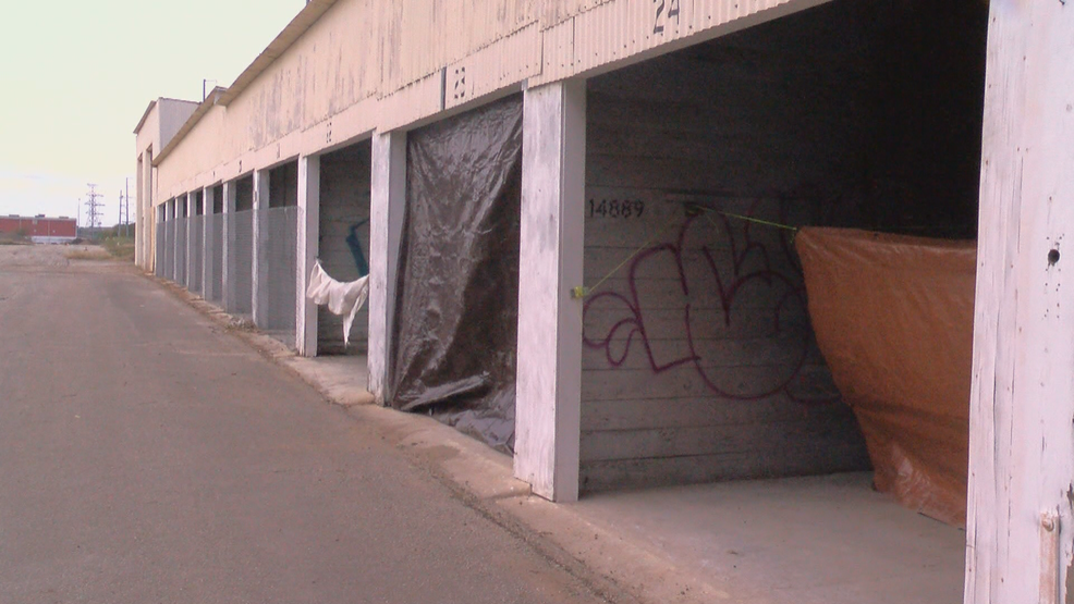 A week in, almost a dozen people moved into Gov. Abbott's designated encampment area