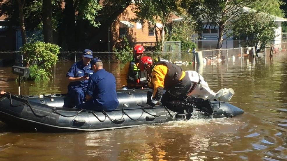 Thousands rescued by swift water boats, helicopters near town of