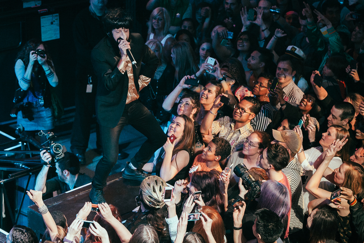 Macklemore and Ryan Lewis made a special appearance at EMP’s Vivid event for the new exhibition Spectacle. The new exhibit is all about music videos so in the spirit Macklemore and Ryan Lewis performed their award winning Thrift Shop and Can’t Hold Us to a screaming crowd. May 16th 2014. (Joshua Lewis / Seattle Refined)