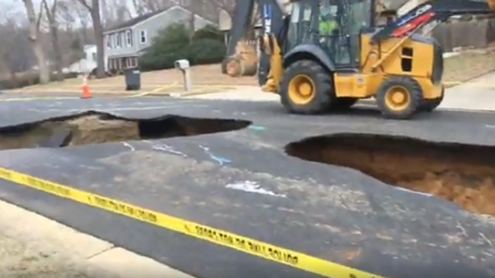 Massive Sinkhole Guts Virginia Road After 2 Water Main