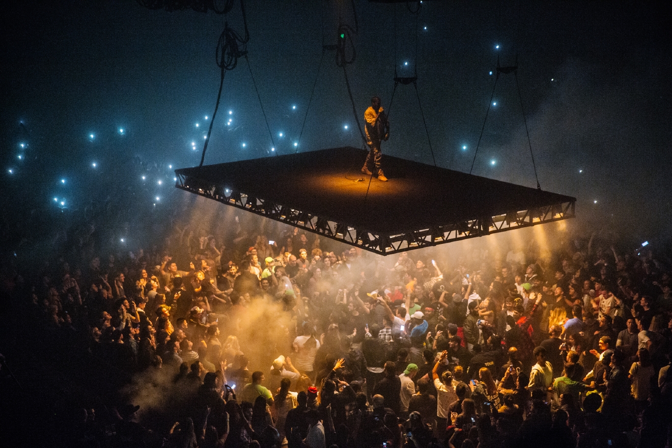 Photos Kanye West floats into Seattle on a suspended stage Seattle