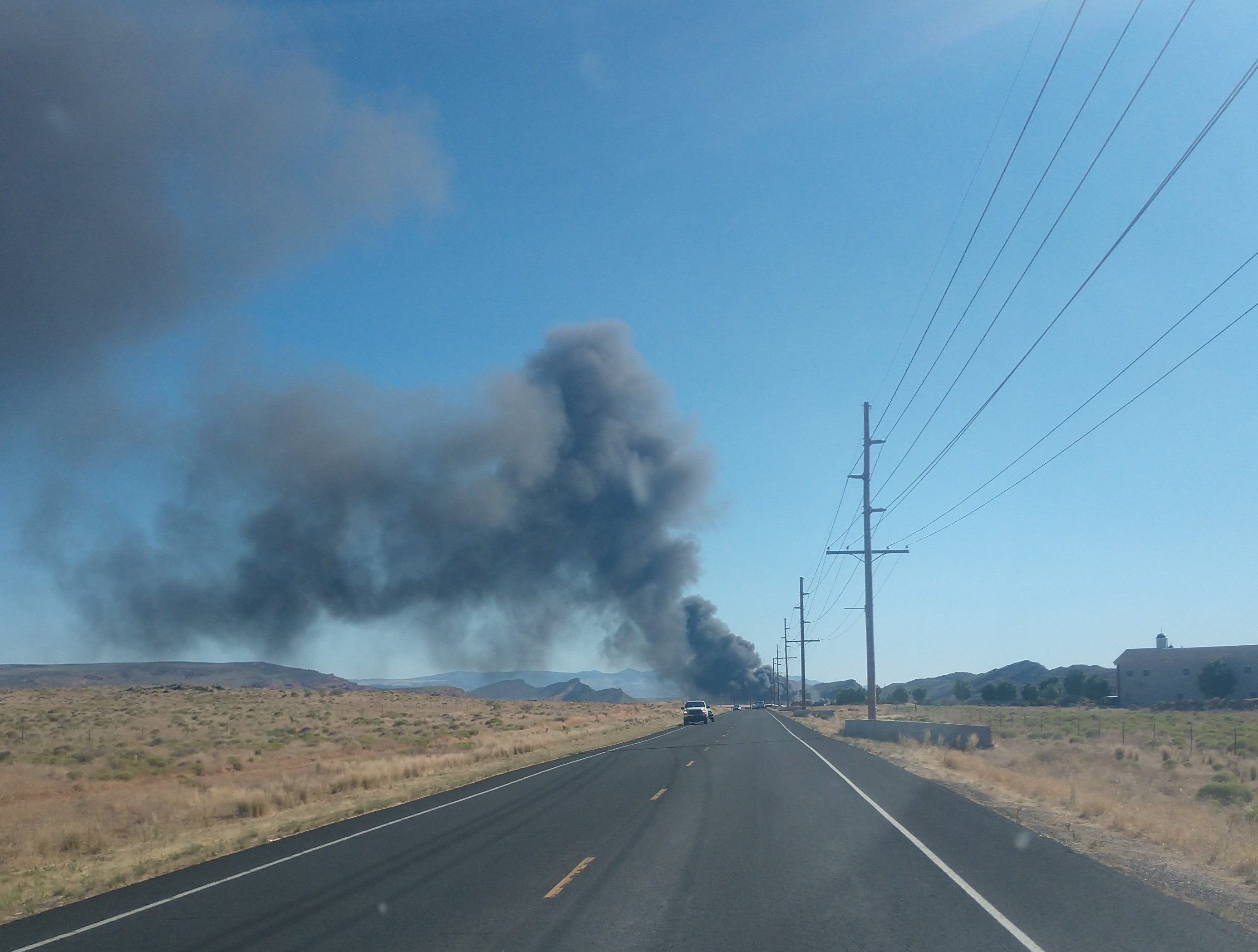 Smoky 'Pecan Fire' near Hurricane burns 75 vehicles at salvage yard KJZZ